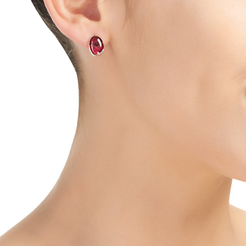 Oval poppy stud earrings on model
