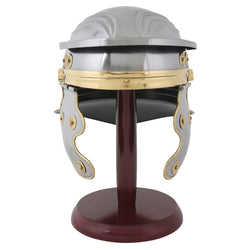 Roman legionnaire’s helmet on wooden stand front view