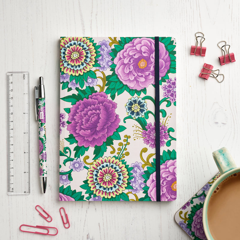 Indian dagger collection floral a5 soft cover journal with pen and coaster on work desk