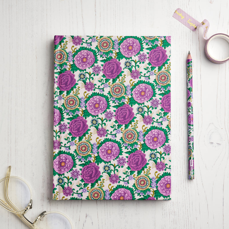 Indian dagger collection floral hardback notebook on desk with pencil
