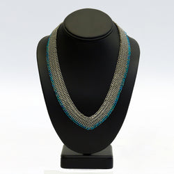 Bishop's mantle blue and gold chain mail collar necklace on display stand