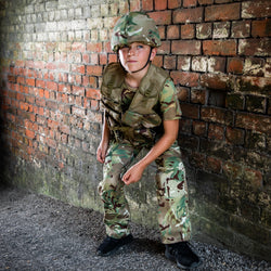 child wearing Children's camo trousers in woodland design
