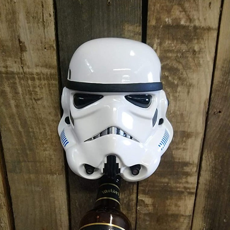 Stormtrooper Helmet Bottle Opener mounted to a wall opening a bottle