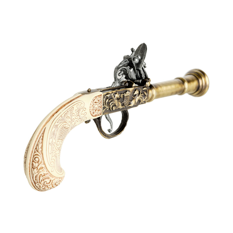 Gold 18th century flintlock pistol hammer and flintlock mechanism and handlegrip close up detail