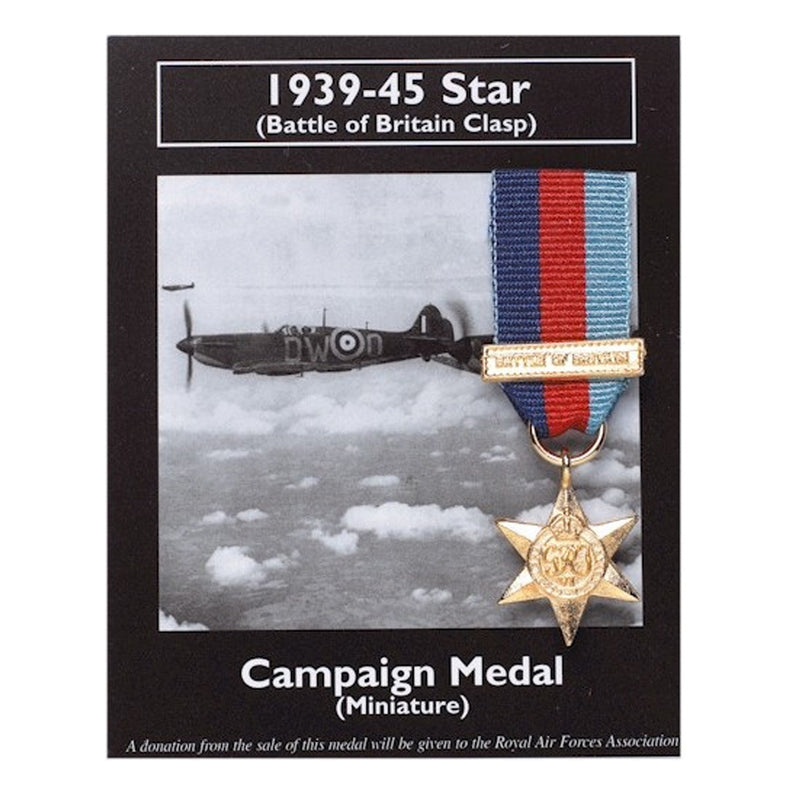 Gold battle of Britain clasp medal with blue and red stripe ribbon on a backing card with an image of a spitfire
