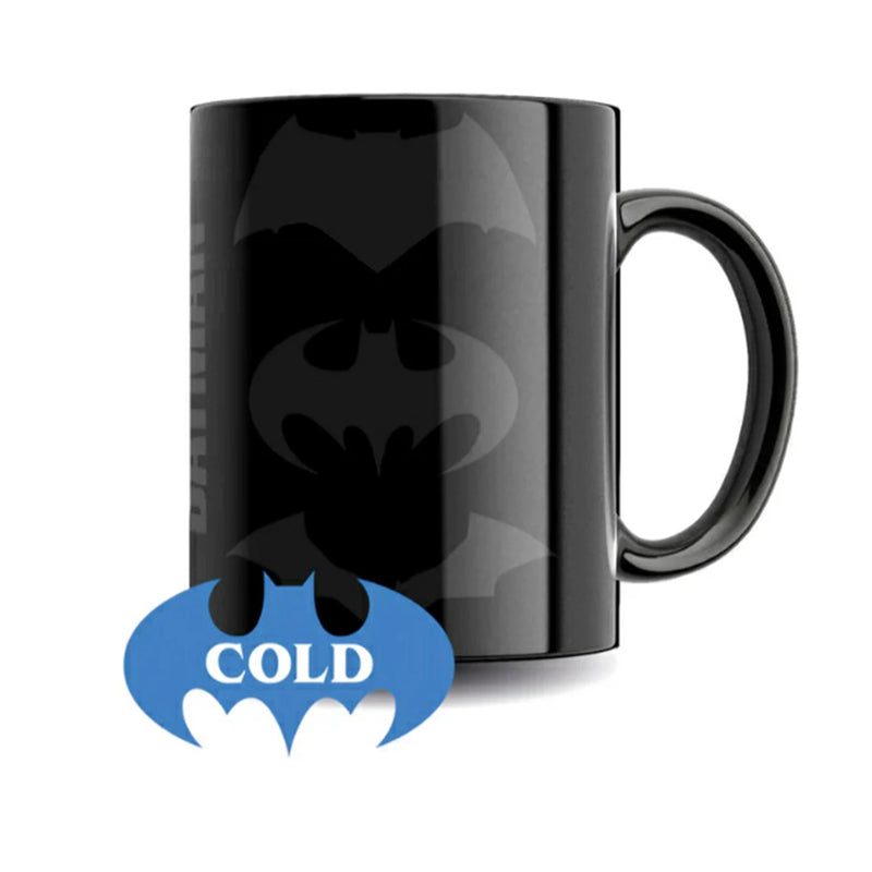 Black mug with a cartoon character and 'Cold' label on a white background