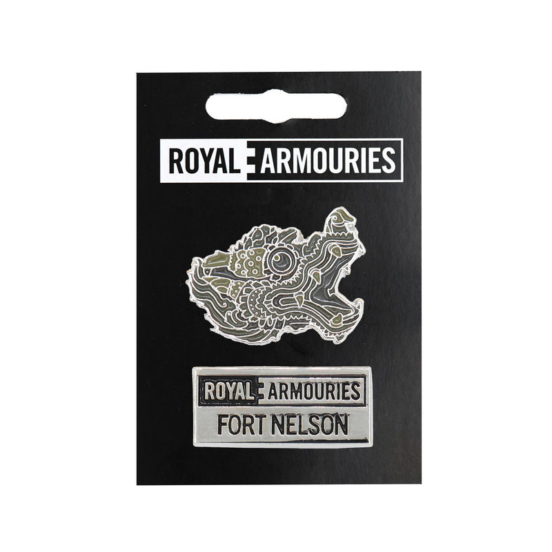 fort nelson dragon cannon and fort nelson logo pin badge on royal armouries backing board