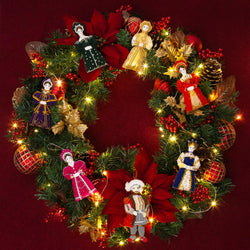 henry viii and six wives hanging decorations on Christmas wreath