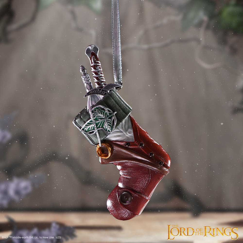 Lord of the Rings Frodo Stocking Hanging decoration with Sting, One Ring, and leaf brooch details in snowy forest environment