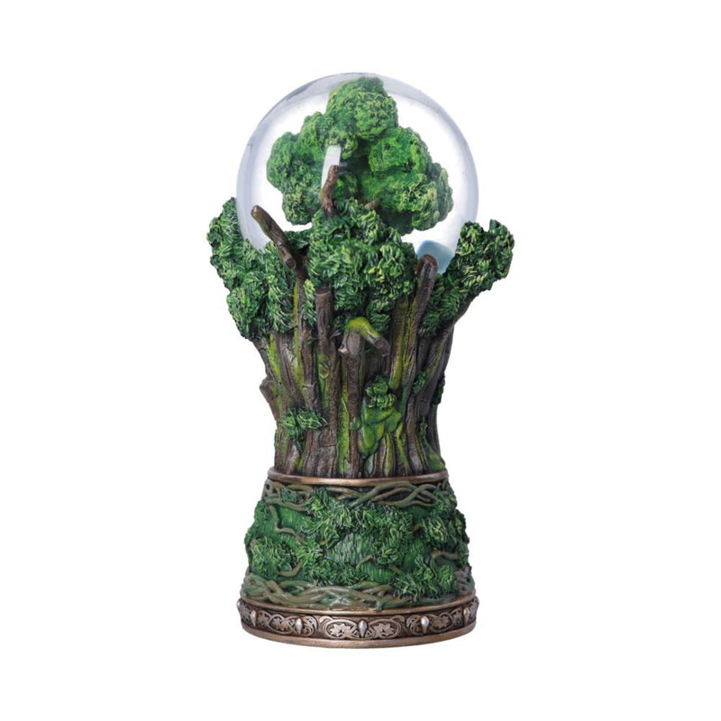 Decorative piece with green foliage and a glass dome on a white background