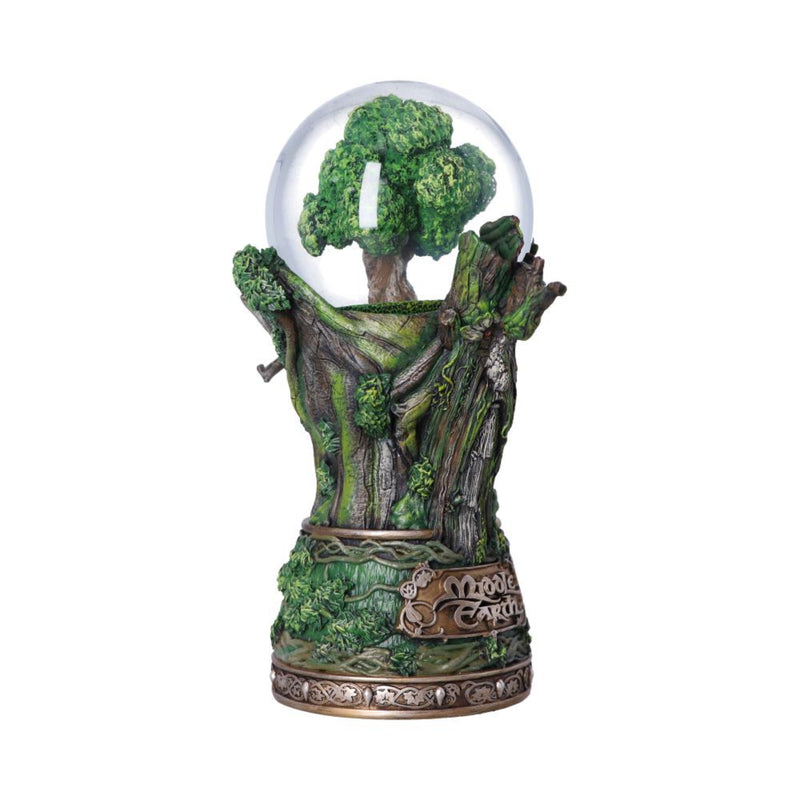 Decorative piece with a tree inside a glass dome on a white background