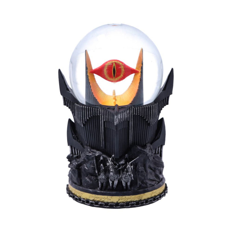 Decorative piece with a crystal ball featuring a red eye design on a black base.