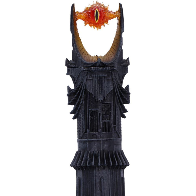 Decorative object resembling a tower with a dragon head on top against a white background