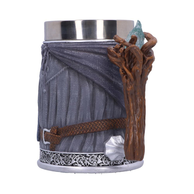 Decorative mug with fantasy design elements on a white background