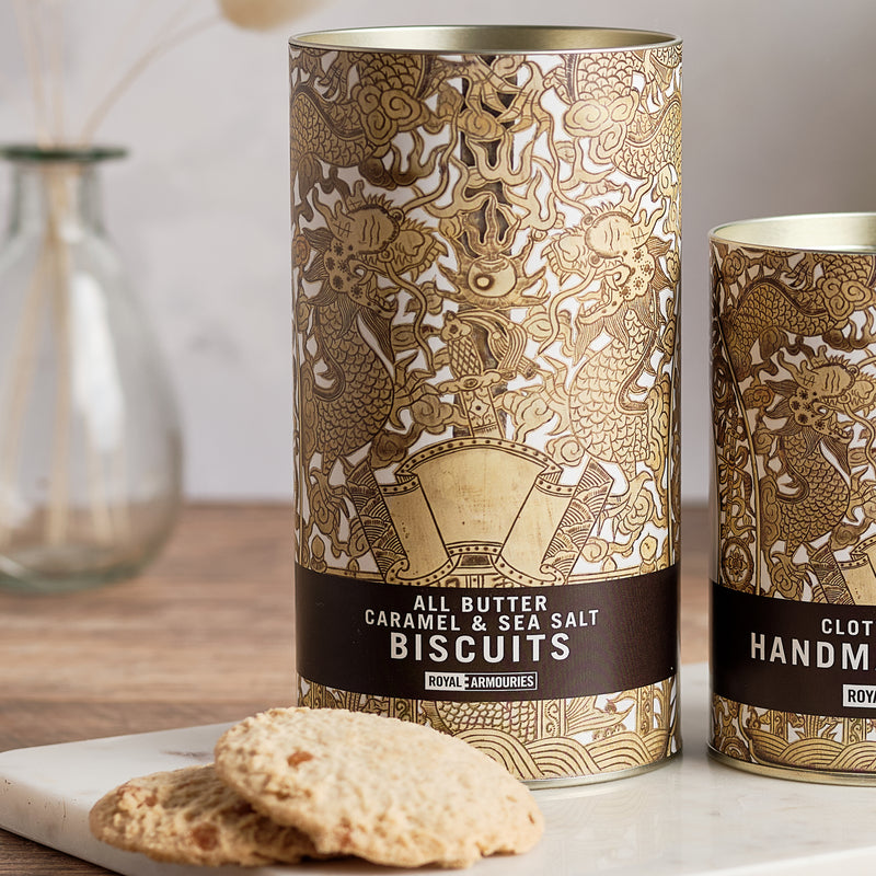 All Butter Caramel and Sea Salt Biscuits - Processional Fan package displayed next to a small handful of biscuits