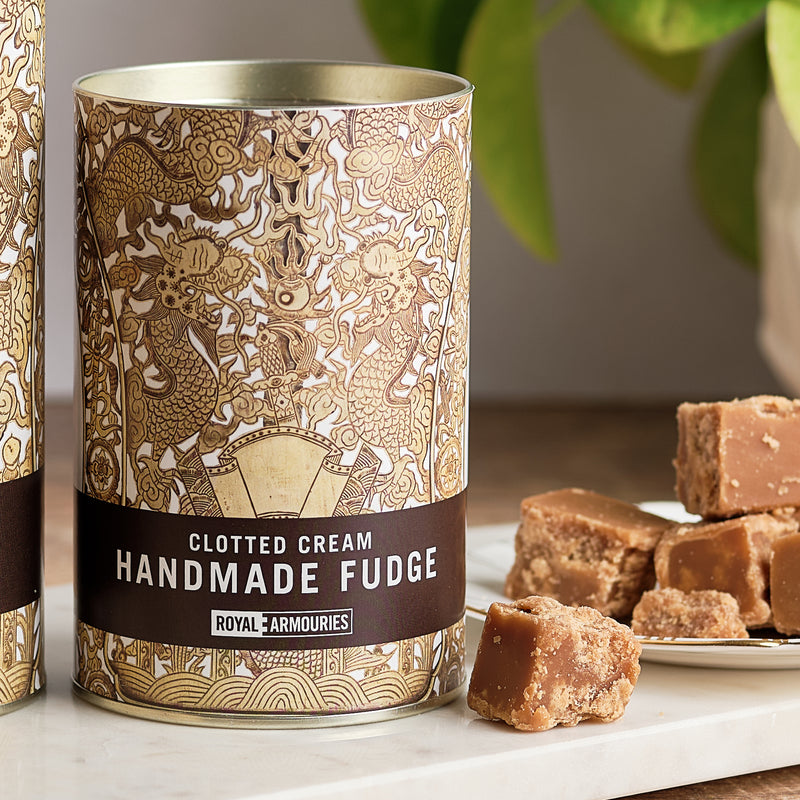 Clotted Cream Handmade Fudge - Processional Fan package displayed next to plate of fudge