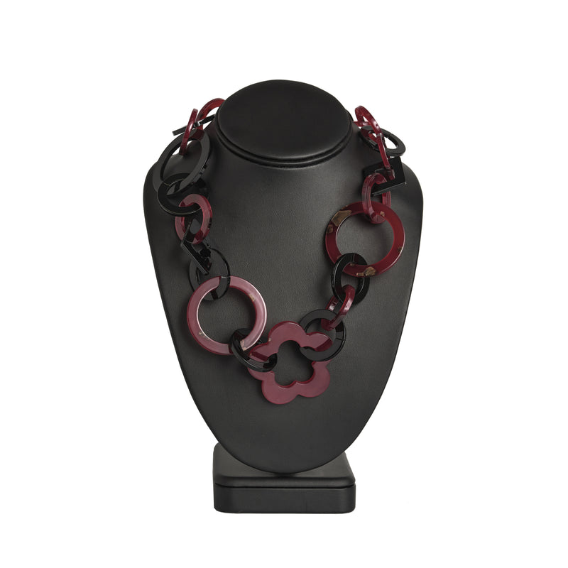 black and tortoiseshell red acrylic chainmail necklace on display stand