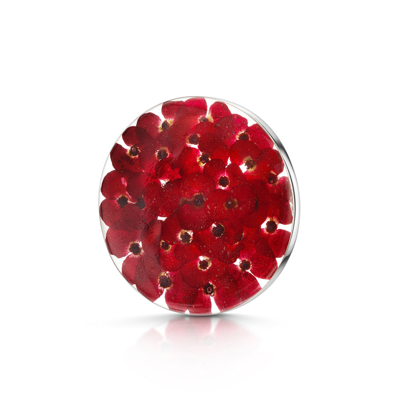 Clear resin poppy broach with real flowers inside front left view