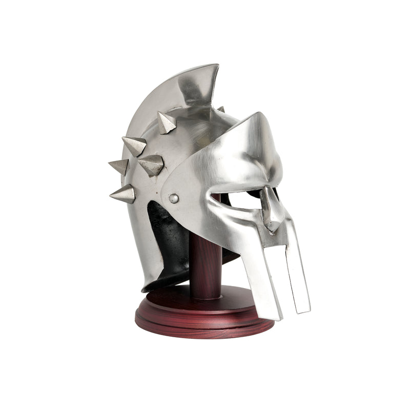 Side view of a miniature silver roman gladiator helmet displayed on a stand