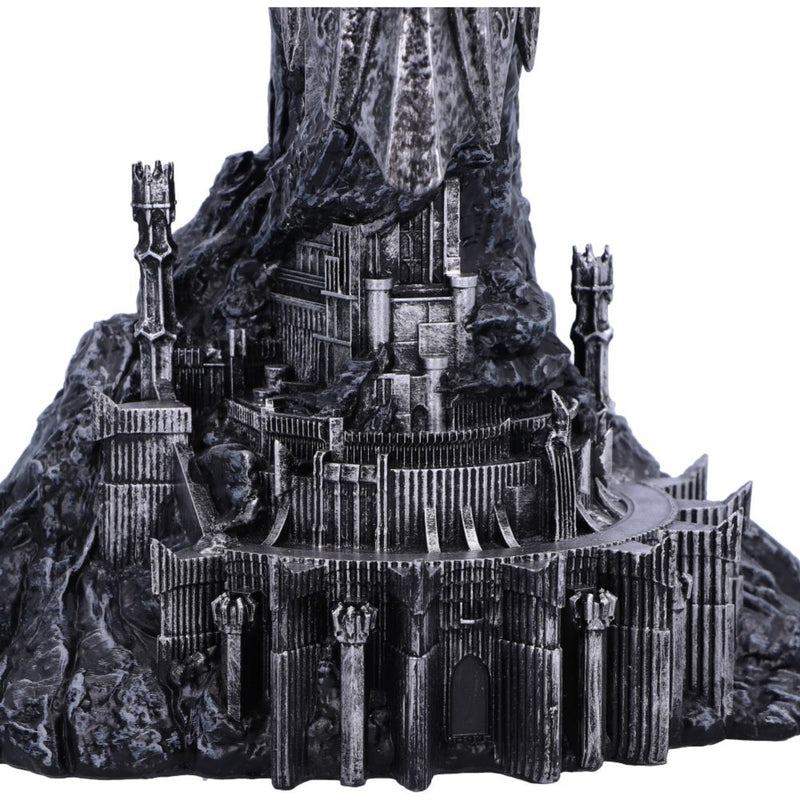 Model of a fantasy castle mordor on a rocky base with a white background
