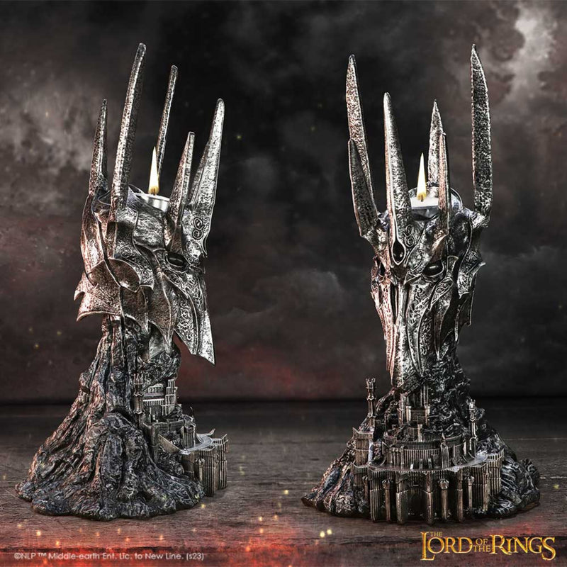 Two Sauron metallic helmets with pointed tops on stands against a dark background, featuring 'The Lord of the Rings' branding.