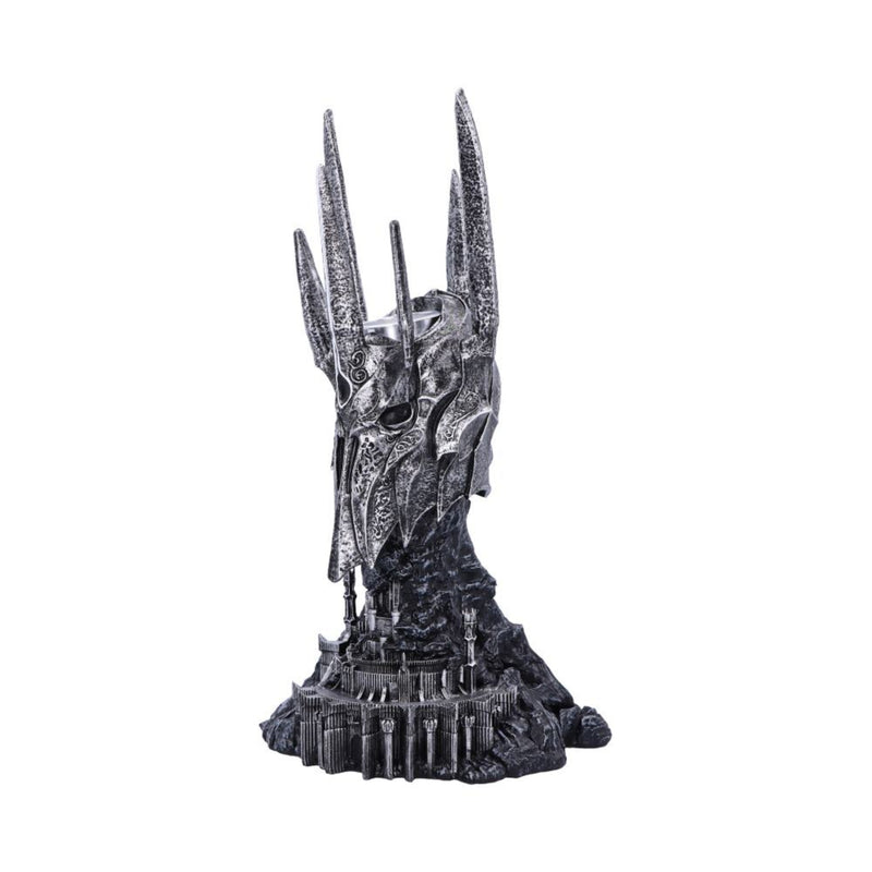 Statue of a Sauron helmet with pointed spikes on a white background