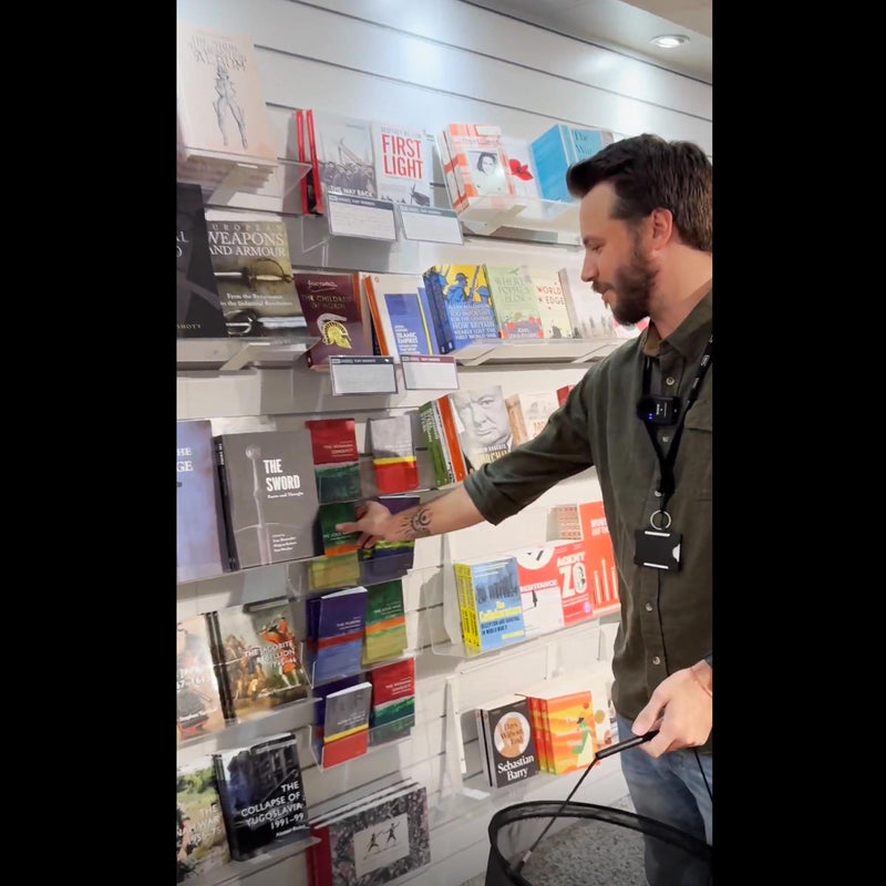 Royal Armouries Assistant Curator of Arms and Armour, Scott Hurst, with the Cold War A Very Short Introduction book in the museum shop