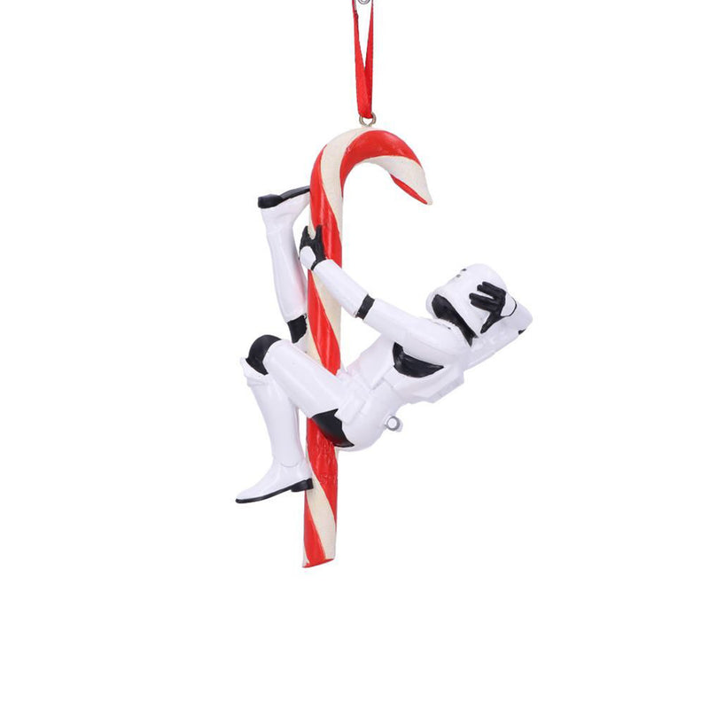 Stormtrooper posed hanging off a candy cane hanging decorative ornament back view