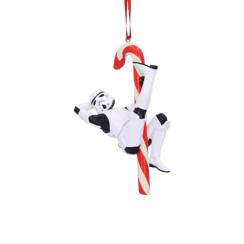 Stormtrooper posed hanging off a candy cane hanging decorative ornament right side view