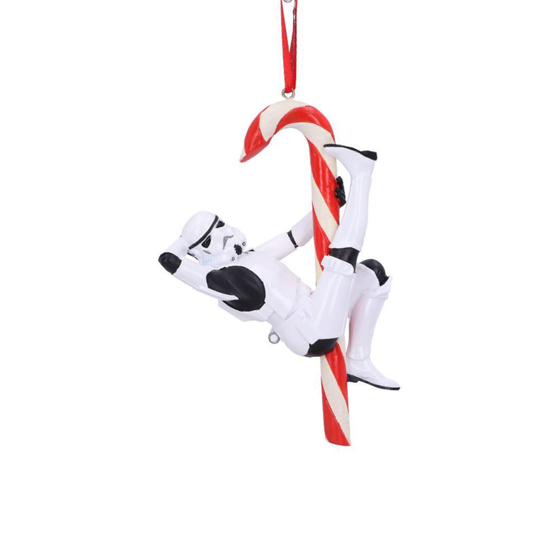 Stormtrooper posed hanging off a candy cane hanging decorative ornament front view