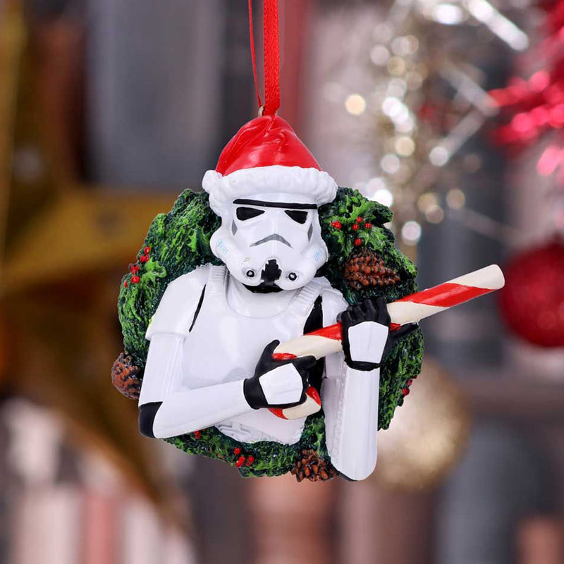Stormtrooper Wreath Hanging Decoration Stormtrooper wearing santa hat and holding candy cane like a blaster front with festive background