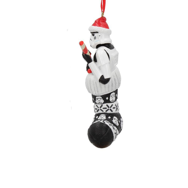 Stormtrooper in a stocking holding a candy cane like a blaster hanging decoration left side view