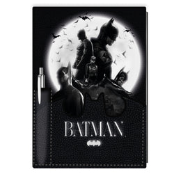 Batman notebook with a black and white illustration of Batman and a pen on a white background