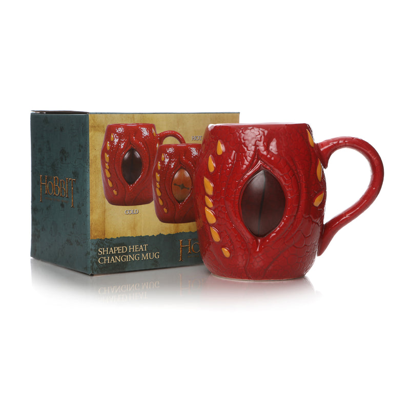 Red smaug shaped colour changing mug displayed in front of its branded packaging