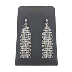 Silver stud earrings with dangling chainmail details on a display stand