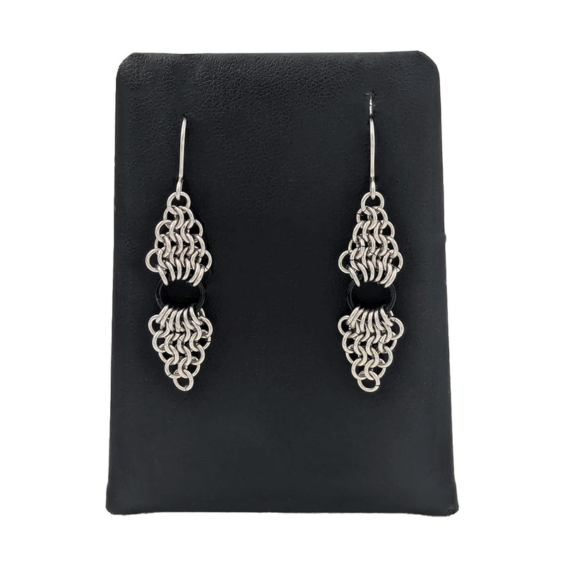 chainmail double diamond with black ring earrings on display stand