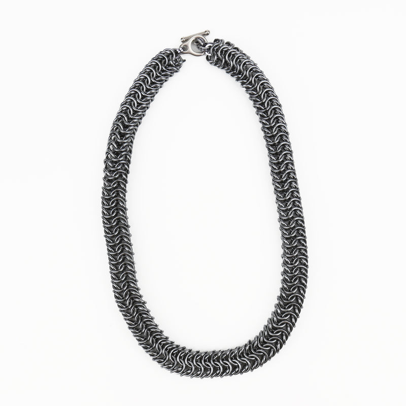 Intricately linked chunky gun metal silver necklace 