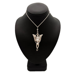 Silver fairy pendant necklace on a black mannequin bust