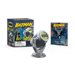 Grey, black and yellow Batman Bat Signal light diplayed next to its branded box