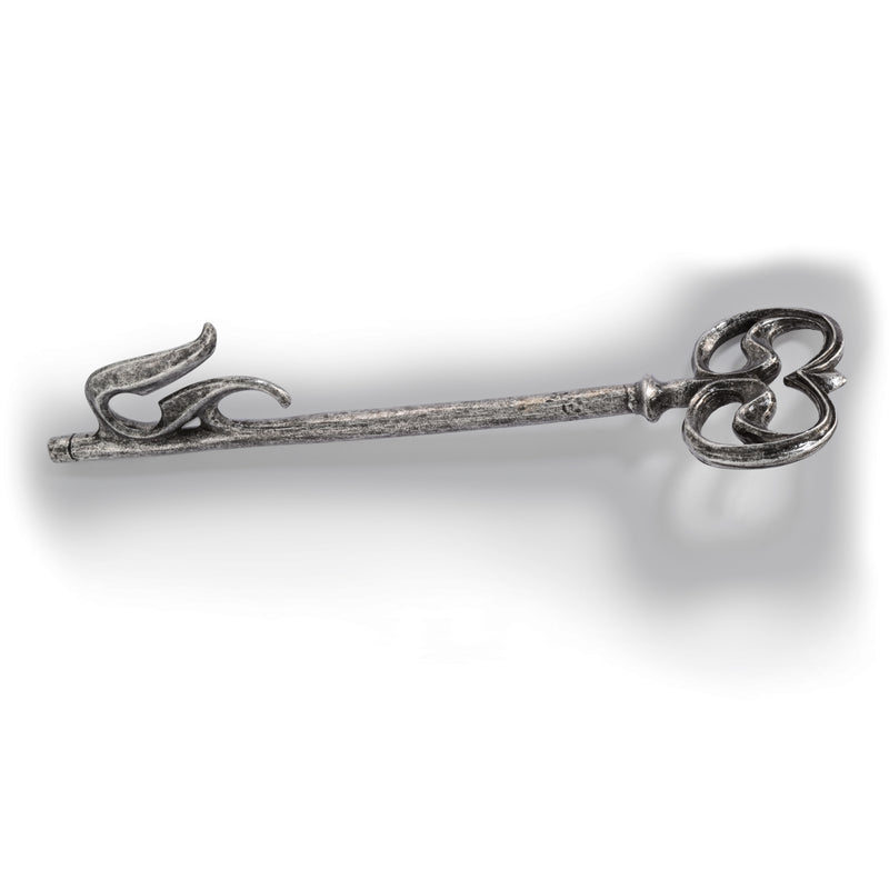Decorative aged silver colour key on a white background