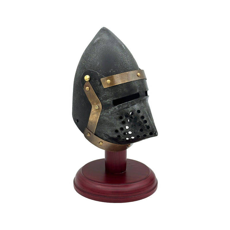 Medieval helmet on a stand with a white background