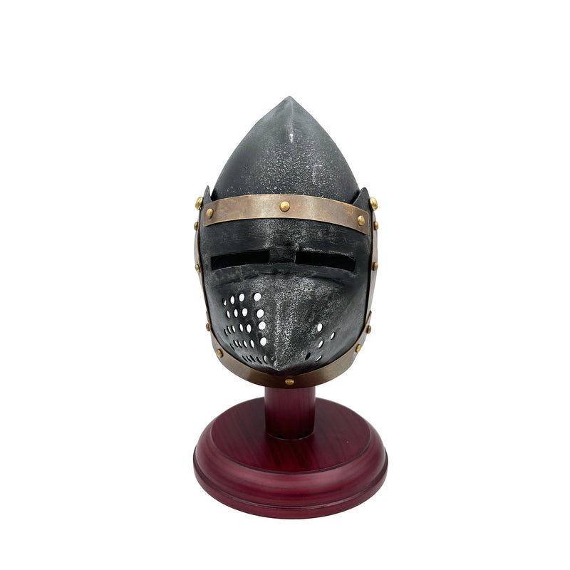 Medieval helmet on a stand with a white background