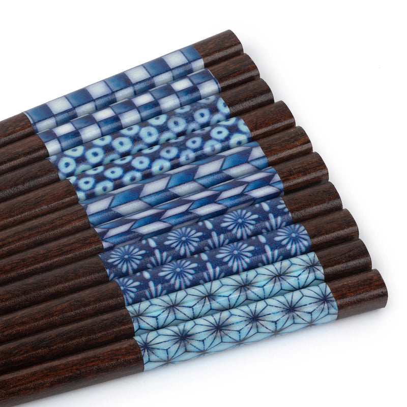 Close up of blue detail chopsticks on white background