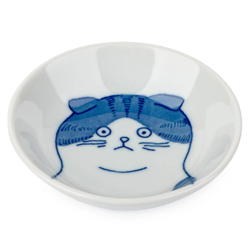 White ceramic dish with blue cat illustration on a white background