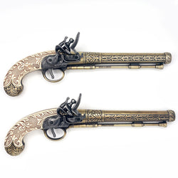 duelling pistols side by side