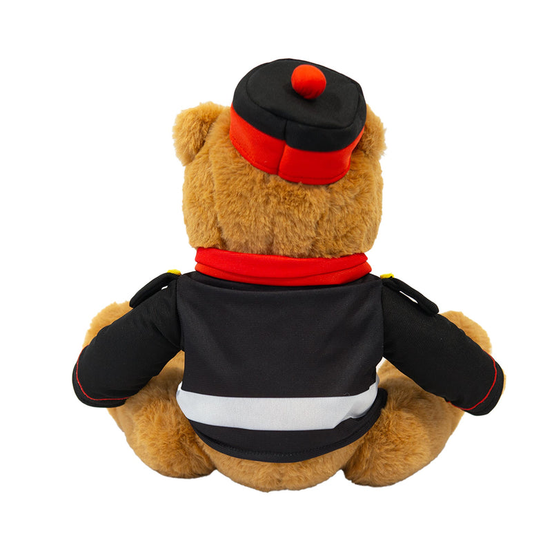 Teddy bear wearing victorian military uniform and hat from back 