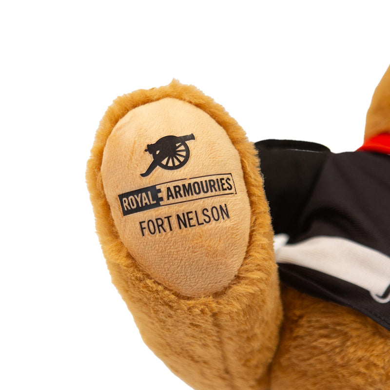 Teddy bear foot with royal armouries fort nelson logo