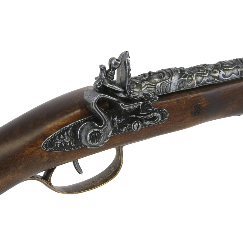 French flintlock musket replica closeup of flintlock mechanism at an angle