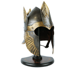 Helm of Isildur with gold and silver accents on a stand against a white background