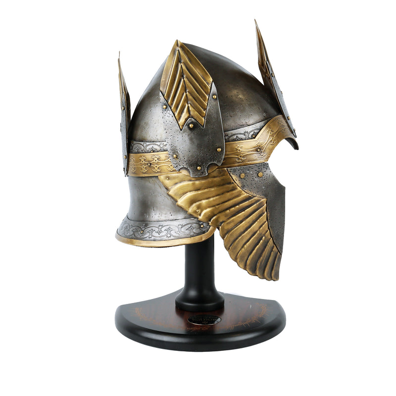 Helm of Isildur with gold and silver details on a black stand against a white background. Right side profile